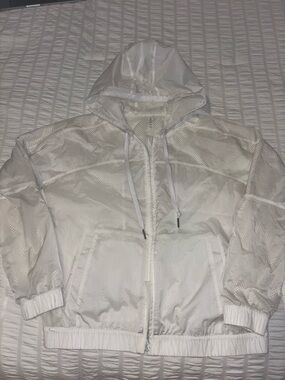 white lululemon zip up jacket